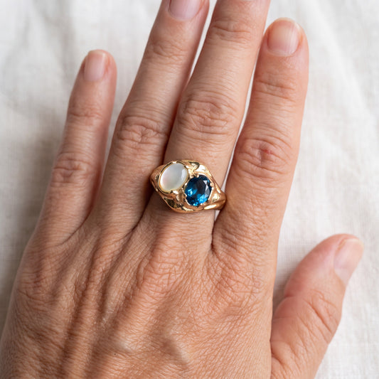 London Blue Topaz and Mother of Pearl Ring worn on the hand, shown true to size