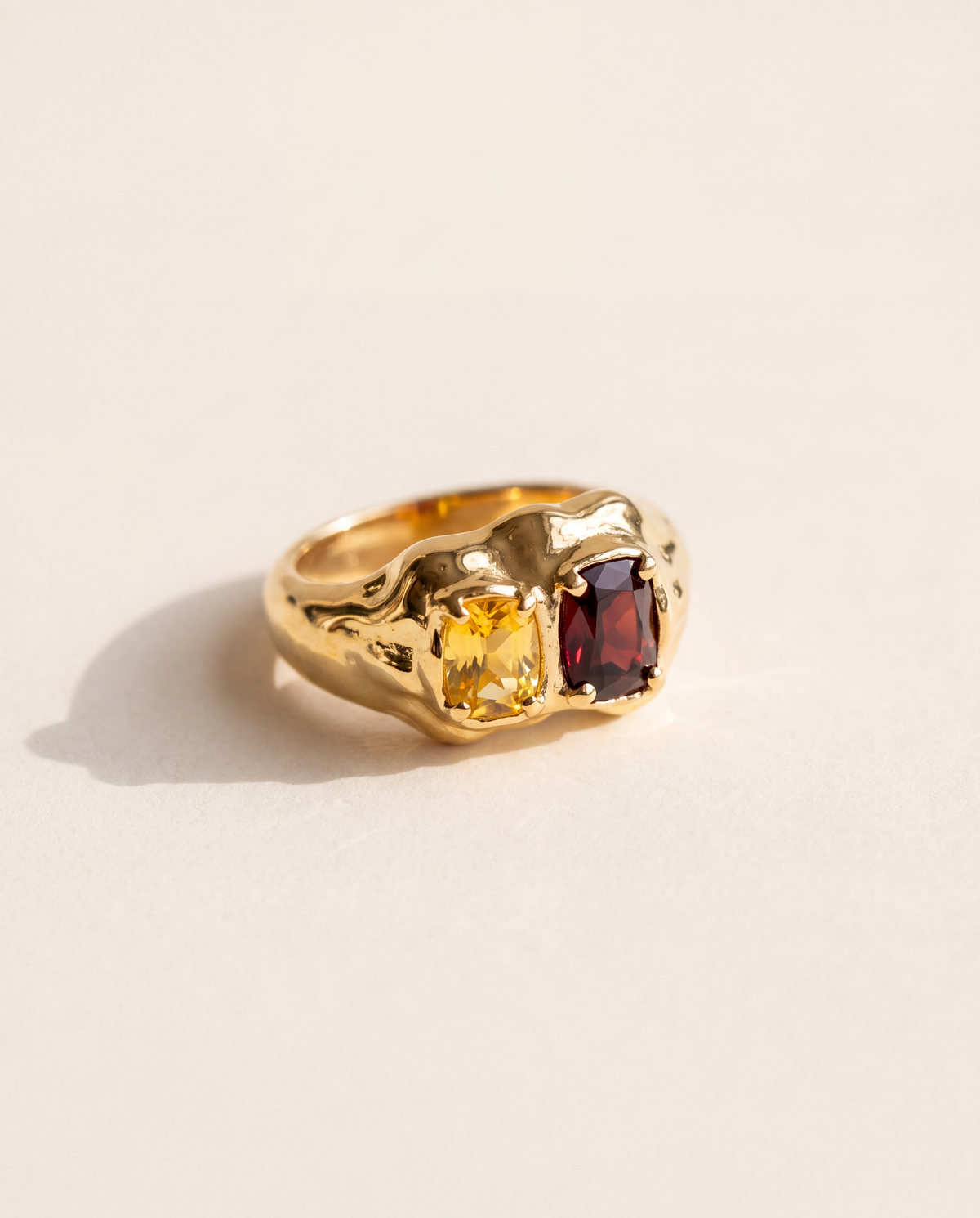 Double Stone Ring in molten 18K gold vermeil with a citrine and a deep red stone side by side