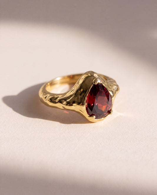 Garnet Tear Ring in 18K gold vermeil with a pear cut rhodolite garnet