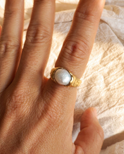 Raw Pearl Molten Ring worn on the hand, shown true to size